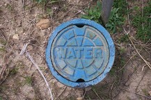 Sewer covered with blue top